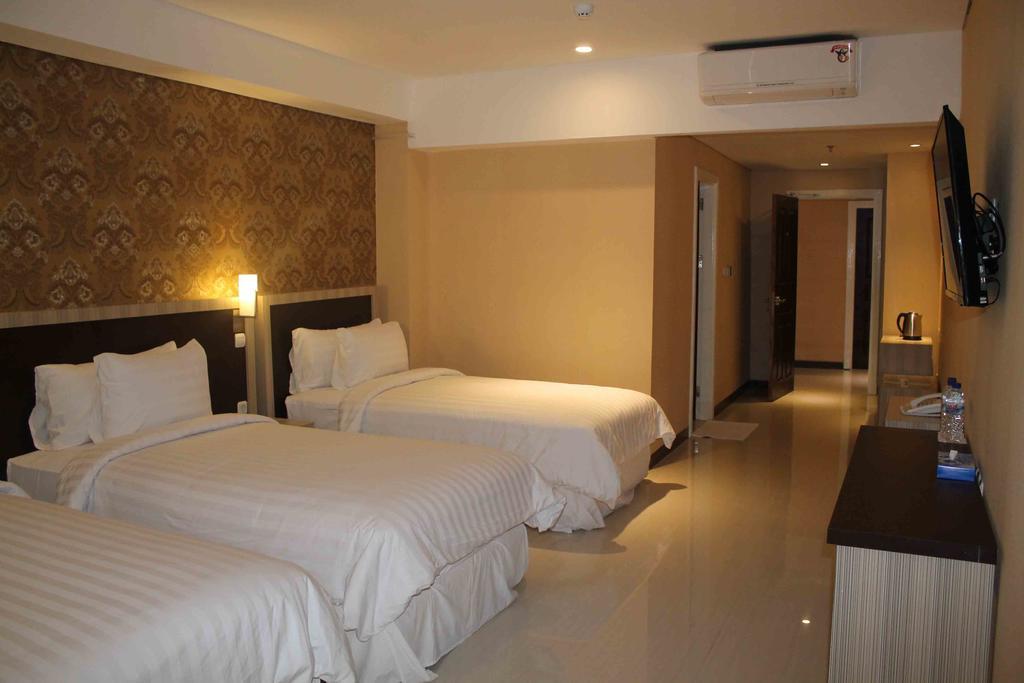Sylvia Hotel Premier Kupang Kupang  Rum bild